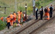 Des agents de la SNCF et des gendarmes sur les lie - © AFP